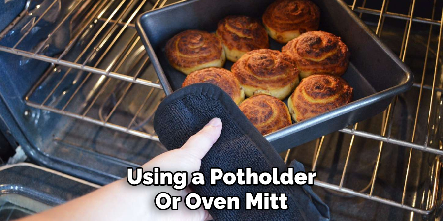 Using a Potholder
Or Oven Mitt