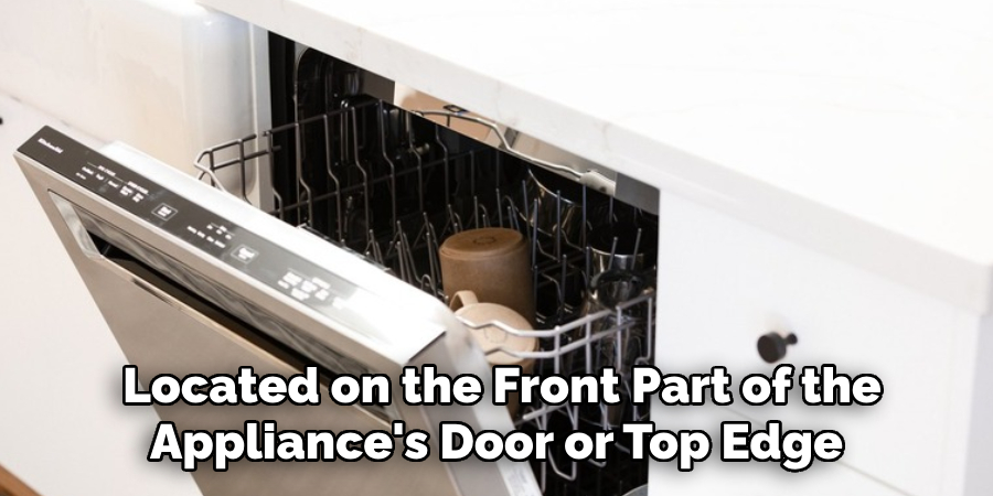 Located on the Front Part of the Appliance's Door or Top Edge