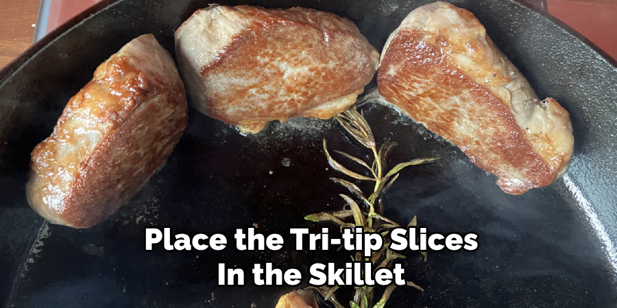 Place the Tri-tip Slices
In the Skillet