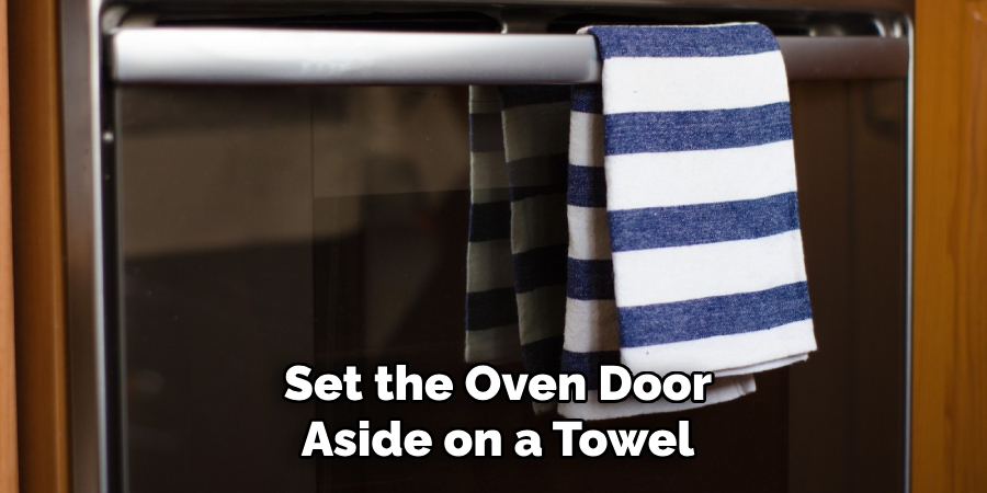 Set the Oven Door
Aside on a Towel