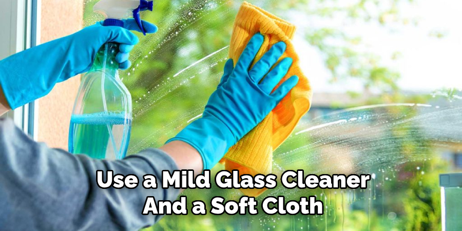 Use a Mild Glass Cleaner
And a Soft Cloth