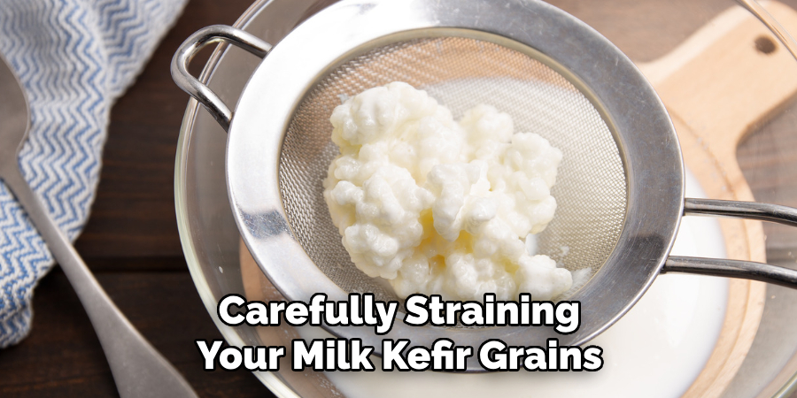 Carefully Straining Your Milk Kefir Grains