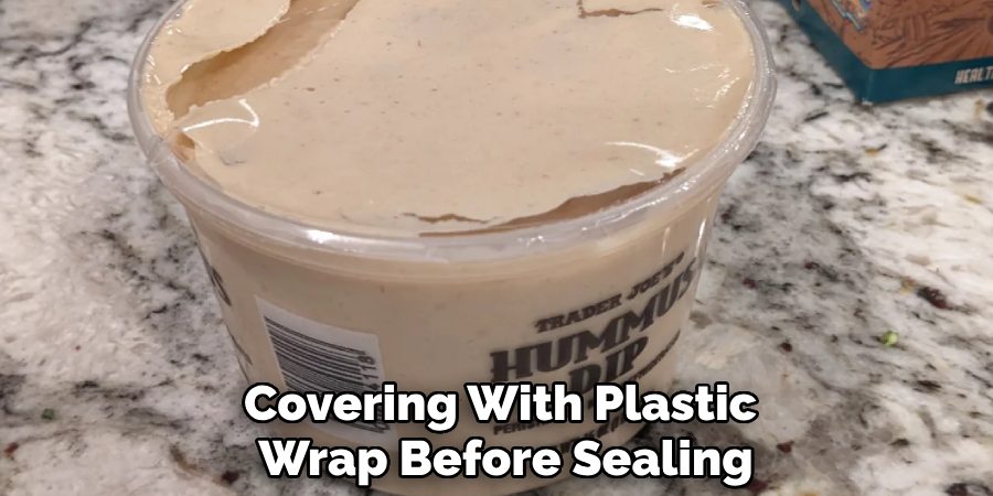 Covering With Plastic
Wrap Before Sealing