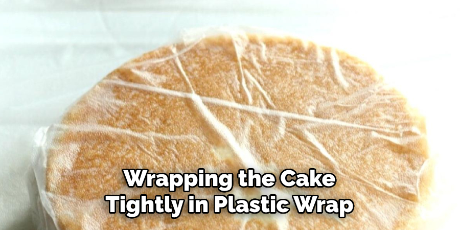 Wrapping the Cake Tightly in Plastic Wrap