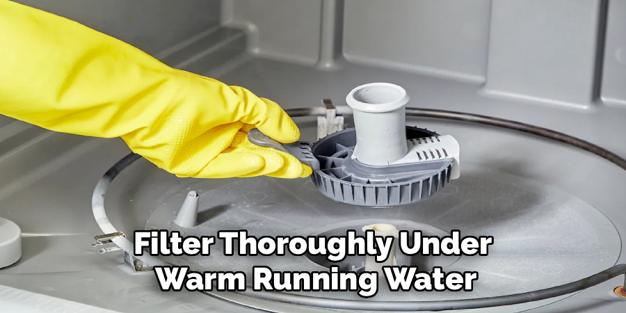 Filter Thoroughly Under 
Warm Running Water